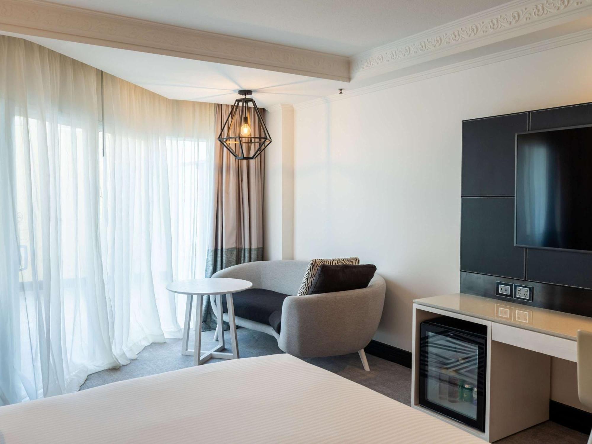Hotel Pullman Cairns International Esterno foto A room at the hotel